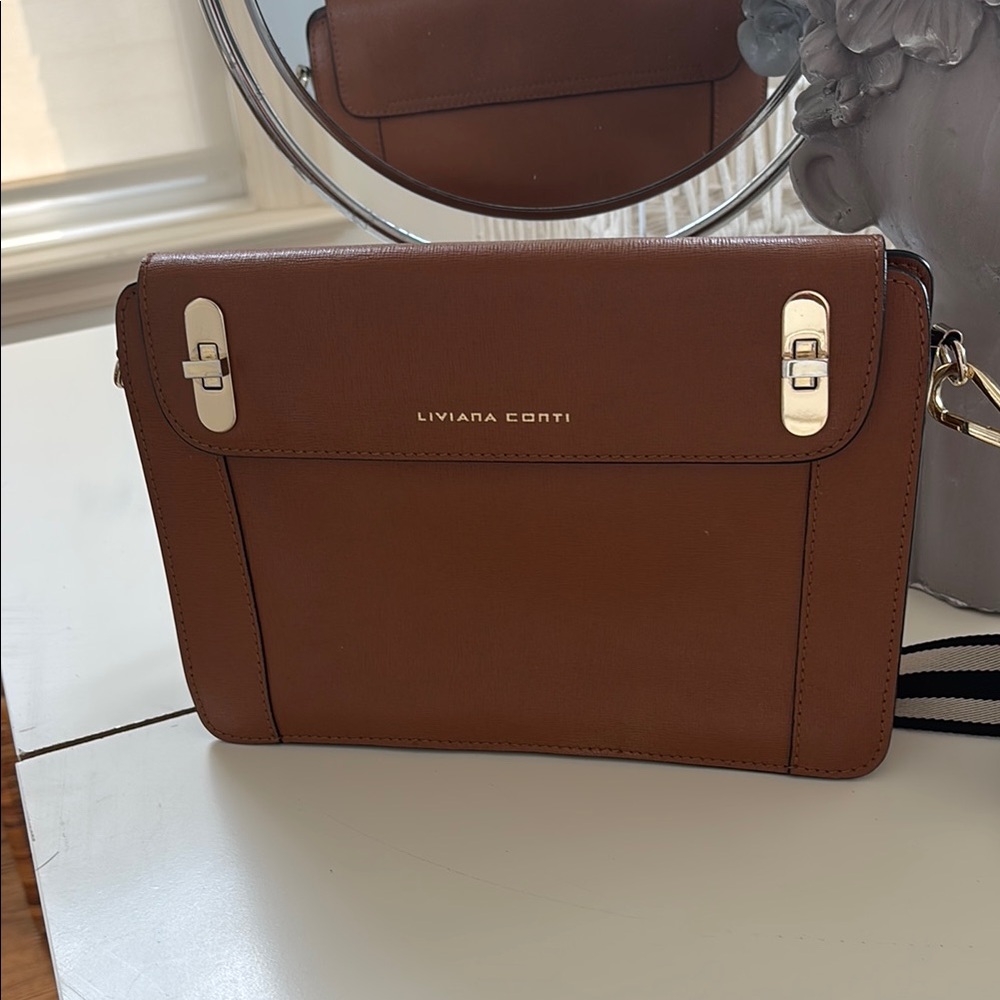 Sleek Brown Leather Crossbody Bag with gold Accents